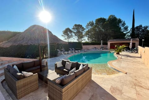 Seasonal outdoor pool, open 9:00 AM to 9:00 PM, pool umbrellas