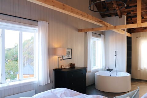 Shower, designer toiletries, hair dryer, bathrobes