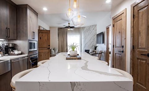 Luxury Condo | Private kitchen | Microwave, coffee/tea maker, toaster, paper towels