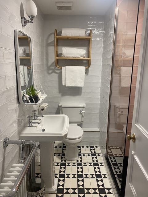 Deep soaking tub, rainfall showerhead, free toiletries, hair dryer