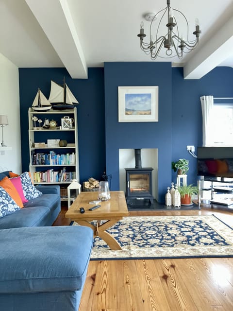 Split level living room with wood burning stove for a cosy evening in.