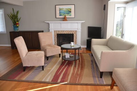 Bright and open living room, furnished with new and stylish furniture