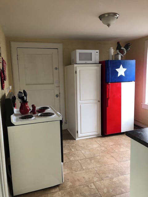 Kitchen with door to laundry room