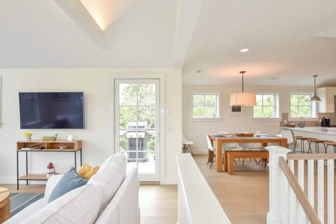 living room to the left, kitchen/ dining room to the right