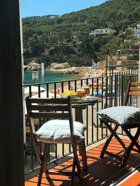 Enjoy a fresh drink while taking in the marvelous view of the beach