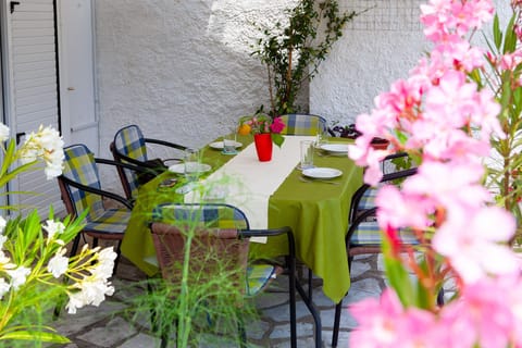 Breakfast on the patio under the canopy