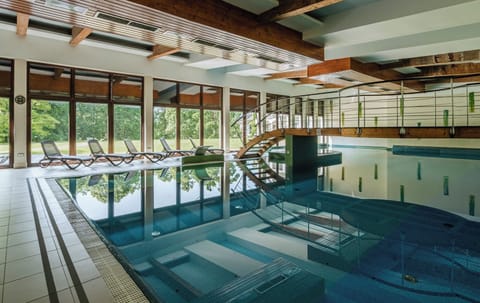 Indoor pool, open 6:00 AM to 10:00 PM, sun loungers