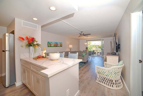 Open-concept layout flows seamlessly into the kitchen and dining area