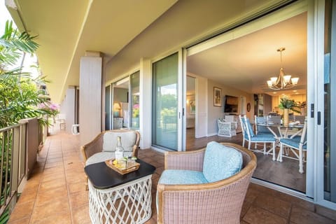 Private lanai features coffee table and chairs