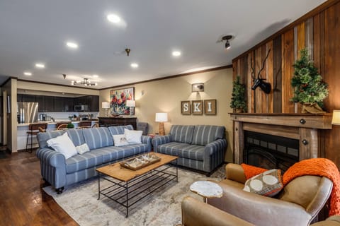 Cozy Living Room with Fireplace and Balcony