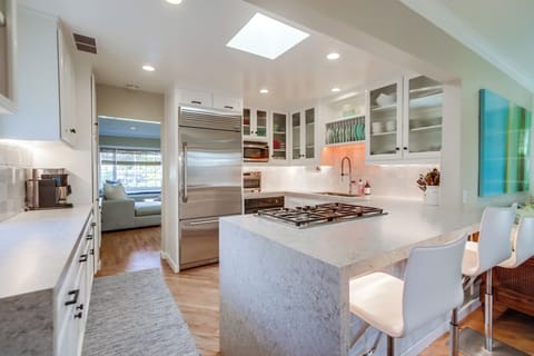 Two coffee machines, toaster oven, microwave, etc