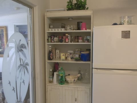 Additional kitchen supplies and storage in hutch