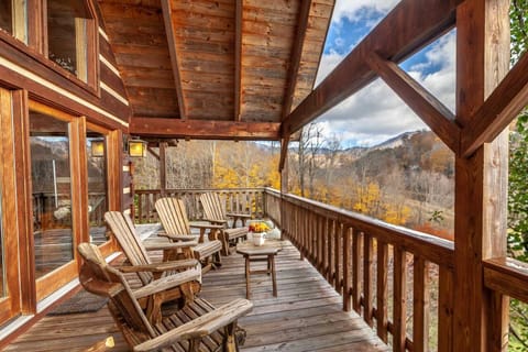 Adirondack Chairs on Main Level Deck Situated to Look Out at Mountain Views