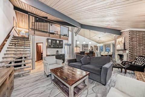 Cavell Penthouse Suite -No AC-fans provided | Living area | Flat-screen TV