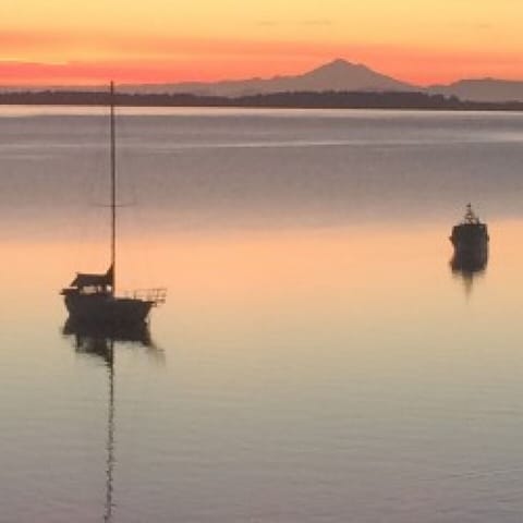 Ocean views at sunrise with Mount Baker in the background