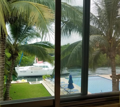Enjoy a view from the Penthouse condo livingroom; as you watch the yachts go by.