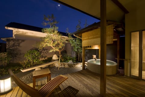 Japanese Western Style Room for 4 Guests with Open-air Bath and Garden View (Type A) | Premium bedding, in-room safe, desk, free WiFi