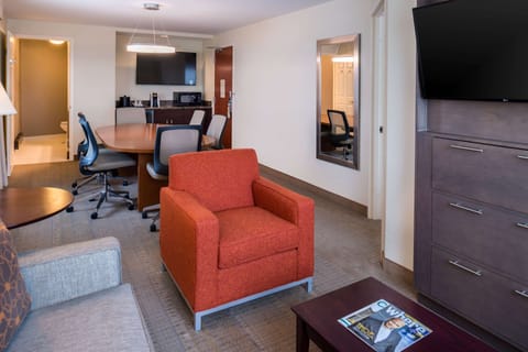 Suite, 1 Queen Bed (Boardroom Suite - Hearing Accessible) | In-room safe, desk, laptop workspace, blackout drapes