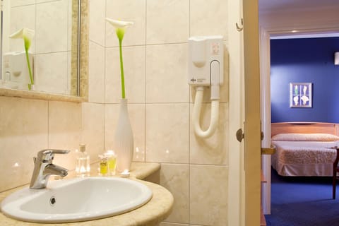 Basic Quadruple Room, 2 Bedrooms, Garden Area | Bathroom | Free toiletries, hair dryer, slippers, towels