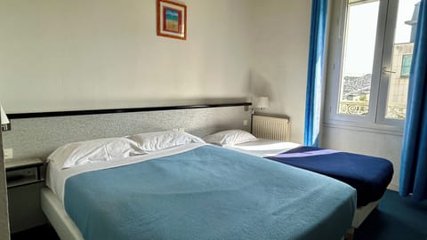 Standard Triple Room | Select Comfort beds, desk, laptop workspace, blackout drapes