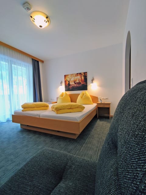 Classic Triple Room, Balcony, Mountain View (located in main- or neighbor house) | Hypo-allergenic bedding, in-room safe, desk, free WiFi