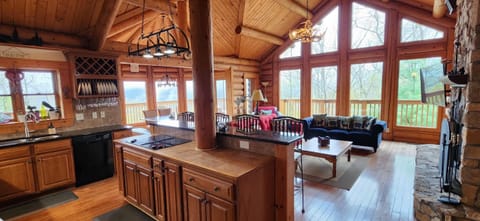 Enjoy beautiful views from all windows in kitchen, dining and living rooms