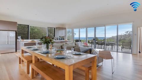 Aloha | Upstairs open plan living area | Kitchen | Dining | Water views