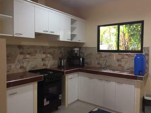 Exclusive Apartment, 2 Queen Beds, Non Smoking | Private kitchen | Fridge, microwave, oven, cookware/dishes/utensils