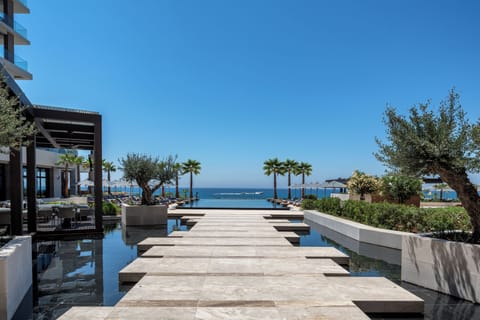 Indoor pool, 2 outdoor pools, open 9:00 AM to 7:00 PM, pool umbrellas