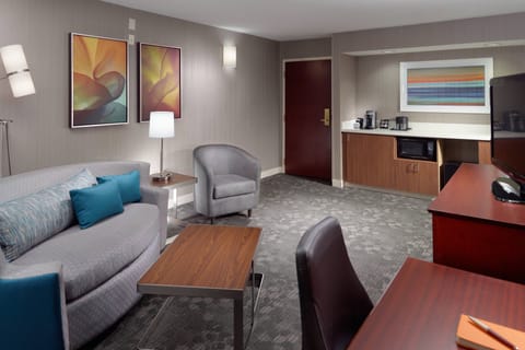 Suite, 1 Bedroom | Living area | 37-inch flat-screen TV with cable channels, TV