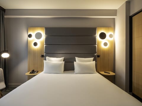 Premium bedding, down comforters, minibar, in-room safe