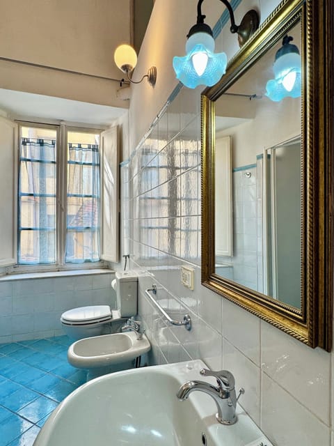 Triple Room, Private Bathroom (External) | Bathroom | Shower, free toiletries, hair dryer, bidet