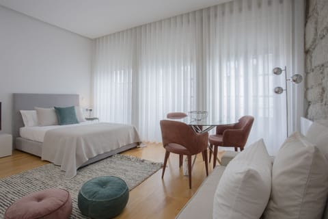 Comfort Studio (3R) | Living area | Flat-screen TV