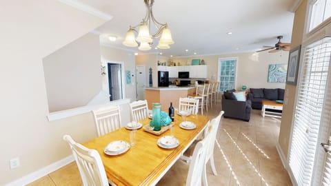 Flowing living, dining, and kitchen areas make this Myrtle Beach vacation home perfect for families and groups.