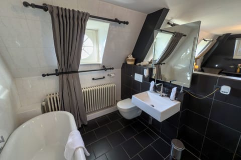 Premium Room | Bathroom | Separate tub and shower, deep soaking tub, designer toiletries