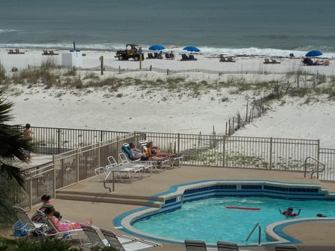 View from balcony of pool and beach