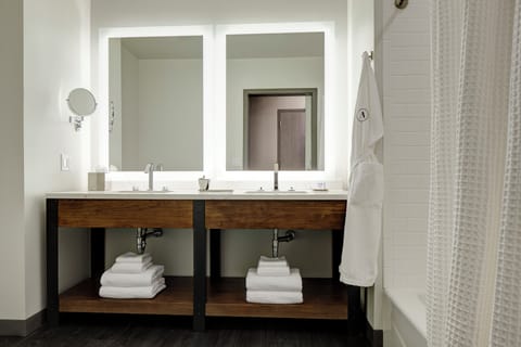 Designer toiletries, hair dryer, bathrobes, slippers