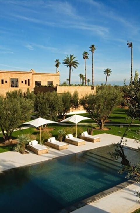 Outdoor pool, pool umbrellas, sun loungers