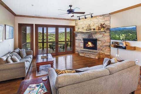 Living Room w/Fireplace & TV