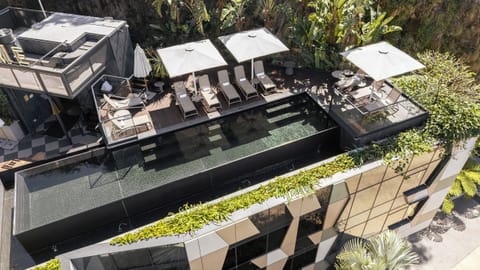 Outdoor pool, open 6:00 AM to 9:00 PM, pool umbrellas, sun loungers