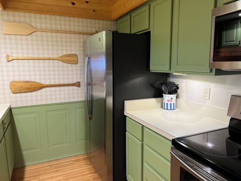 27 cubic foot refrigerator has plenty of space for food and beverages.