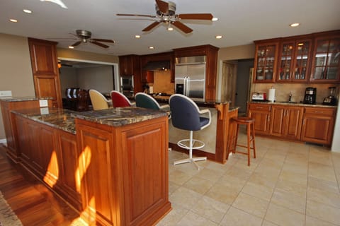Overview of Kitchen. Designed to serve buffet style meals. Granite countertops.