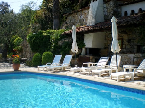 Relax in the beautiful sunshine in the turquoise pool