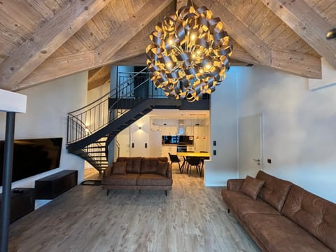 Premium Apartment, 4 Bedrooms, Balcony, Mountainside | Living area | Flat-screen TV, heated floors