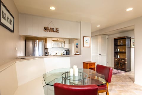 The dining area seats 4.