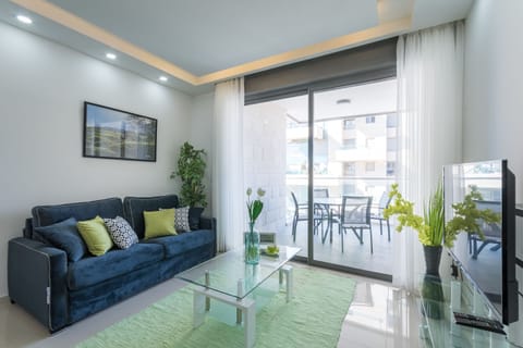 Apartment, 2 Bedrooms, Non Smoking, Garden View | Living room | 42-inch flat-screen TV with satellite channels, TV