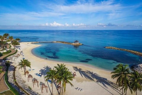 Private beach nearby, white sand, beach shuttle, beach cabanas