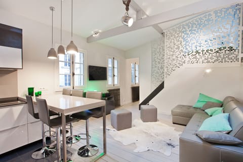 Living room with wide TV screen and DVD/CD,  music player and free WIFI