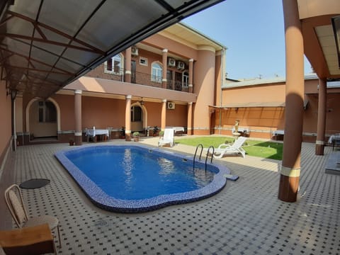 Seasonal outdoor pool, open 7:00 AM to 10:00 PM, sun loungers