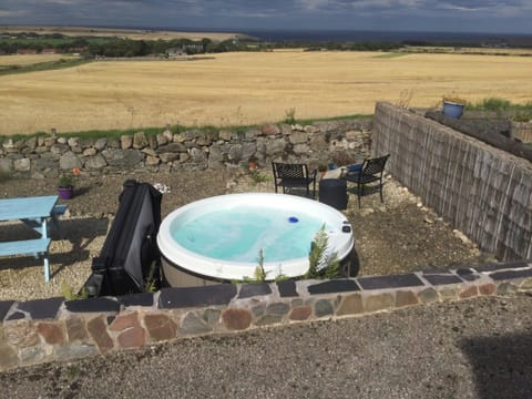 Hot tub with uninterrupted panoramic views towards the coast | The Brae Steading, Fordyce
